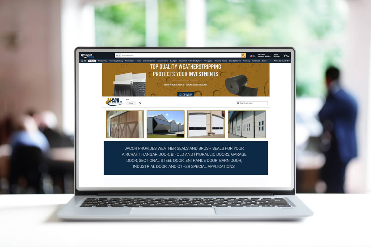 Image of a laptop showing the Amazon store front page for Jacor.